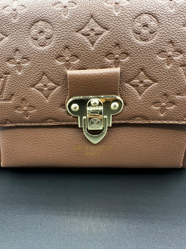 Authentic LV Vavin Chain Bag featuring Iconic Front Flap and Gold Clasp