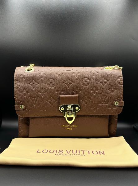 Authentic LV Vavin Chain Bag featuring Iconic Front Flap and Gold Clasp