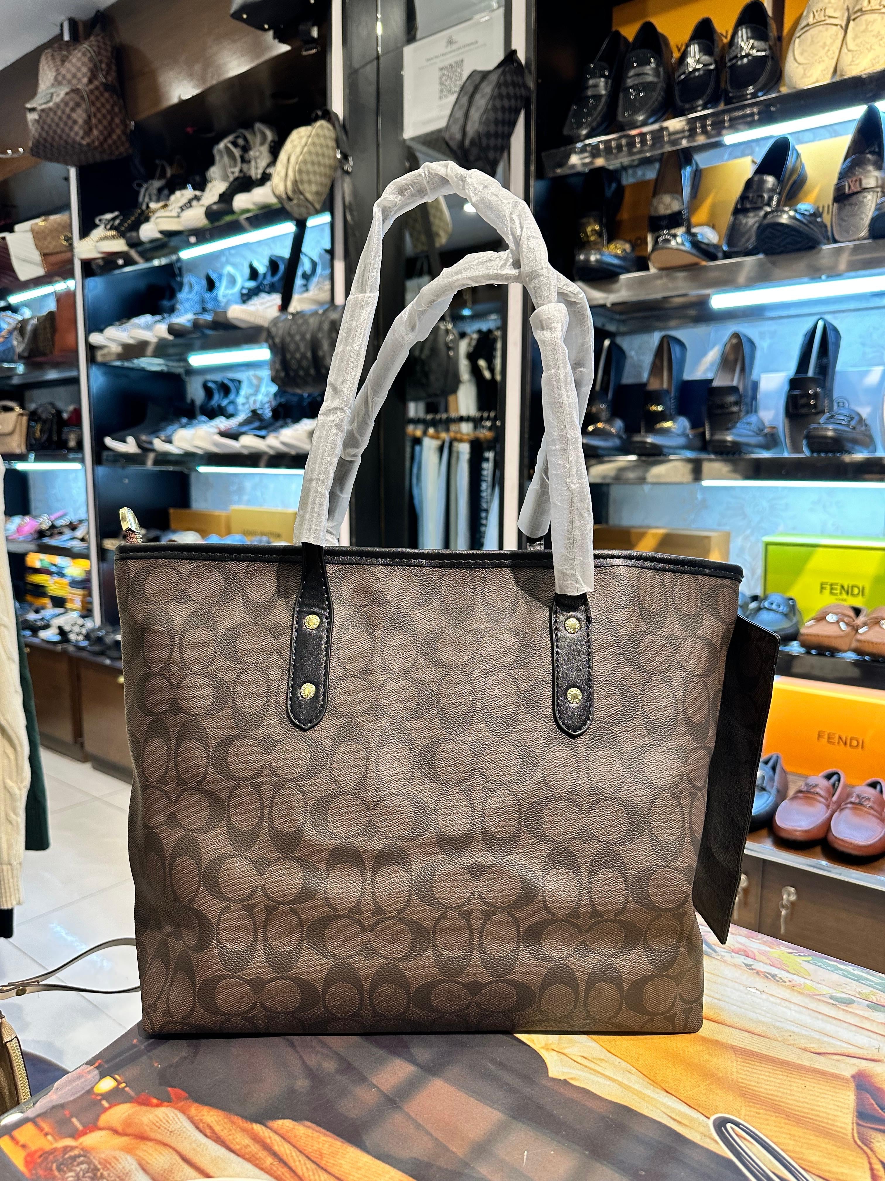 coach city tote in signature dark brown & black monogram canvas coach city tote in signature dark brown & black monogram canvas