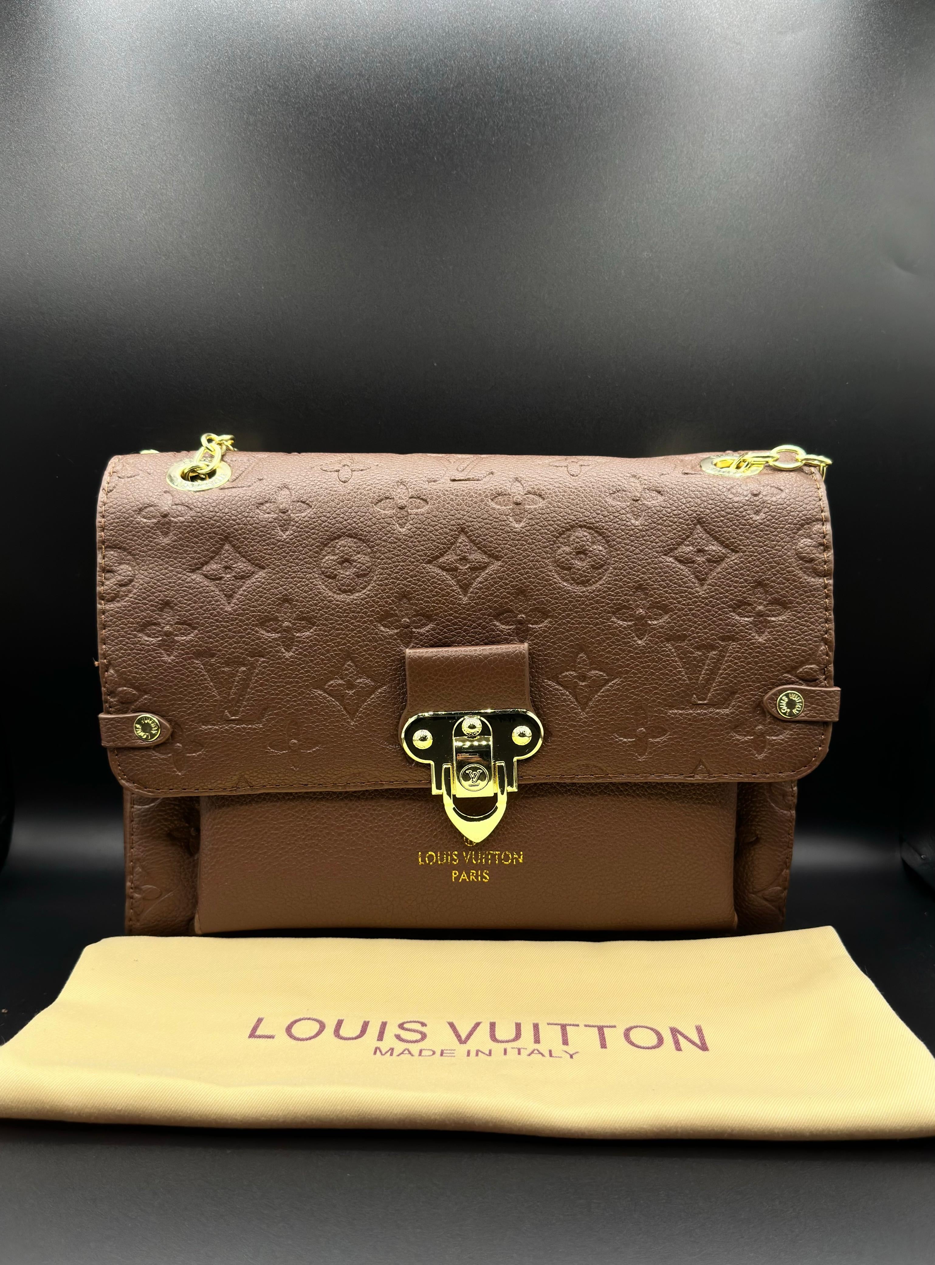 authentic lv vavin chain bag featuring iconic front flap and gold clasp authentic lv vavin chain bag featuring iconic front flap and gold clasp