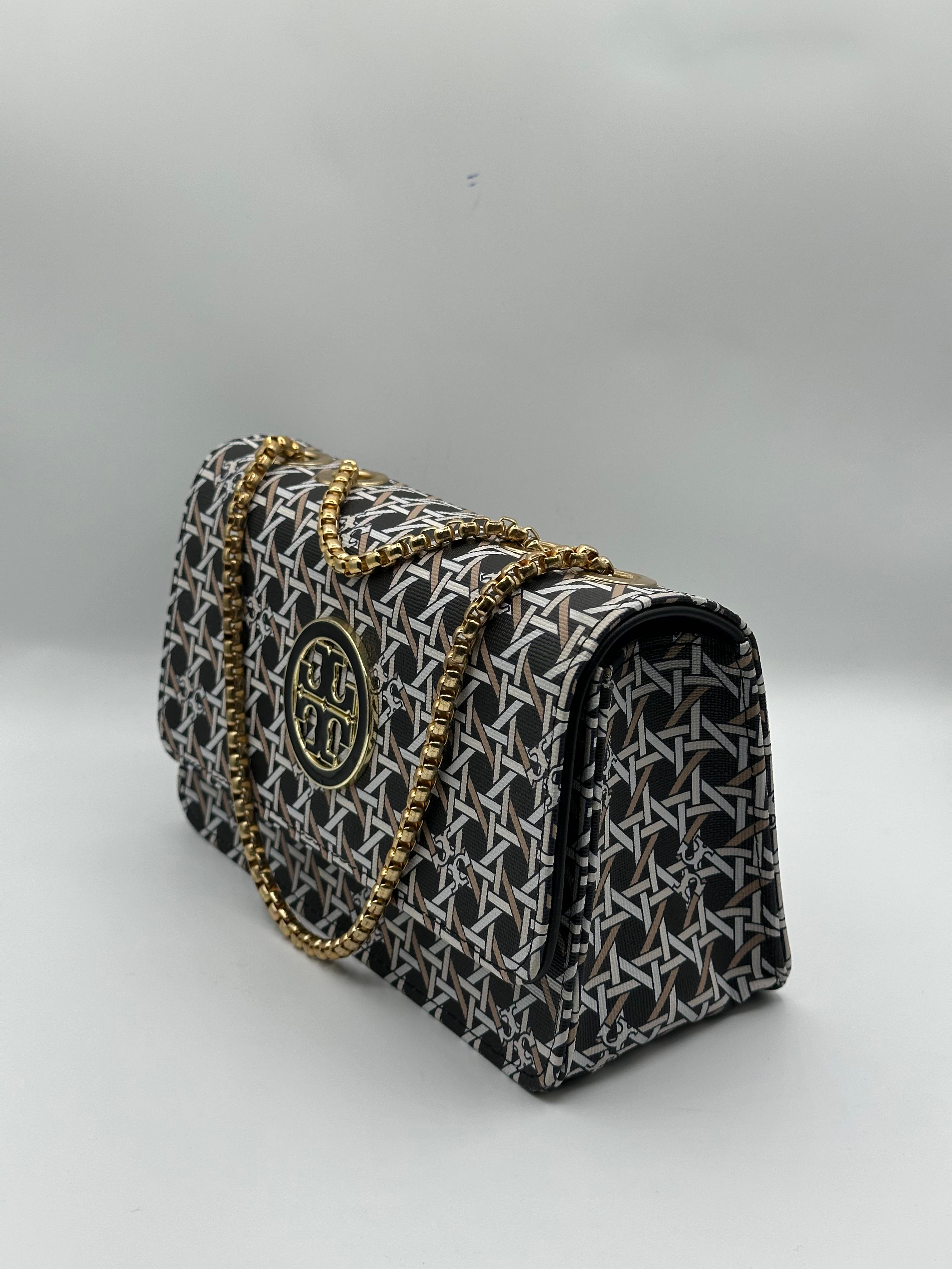 WhatsAppImage2024-12-27at16.50.39 Tory Burch Premium Quality All-Over Printed Ladies Side Bag with Buckle - Image 3
