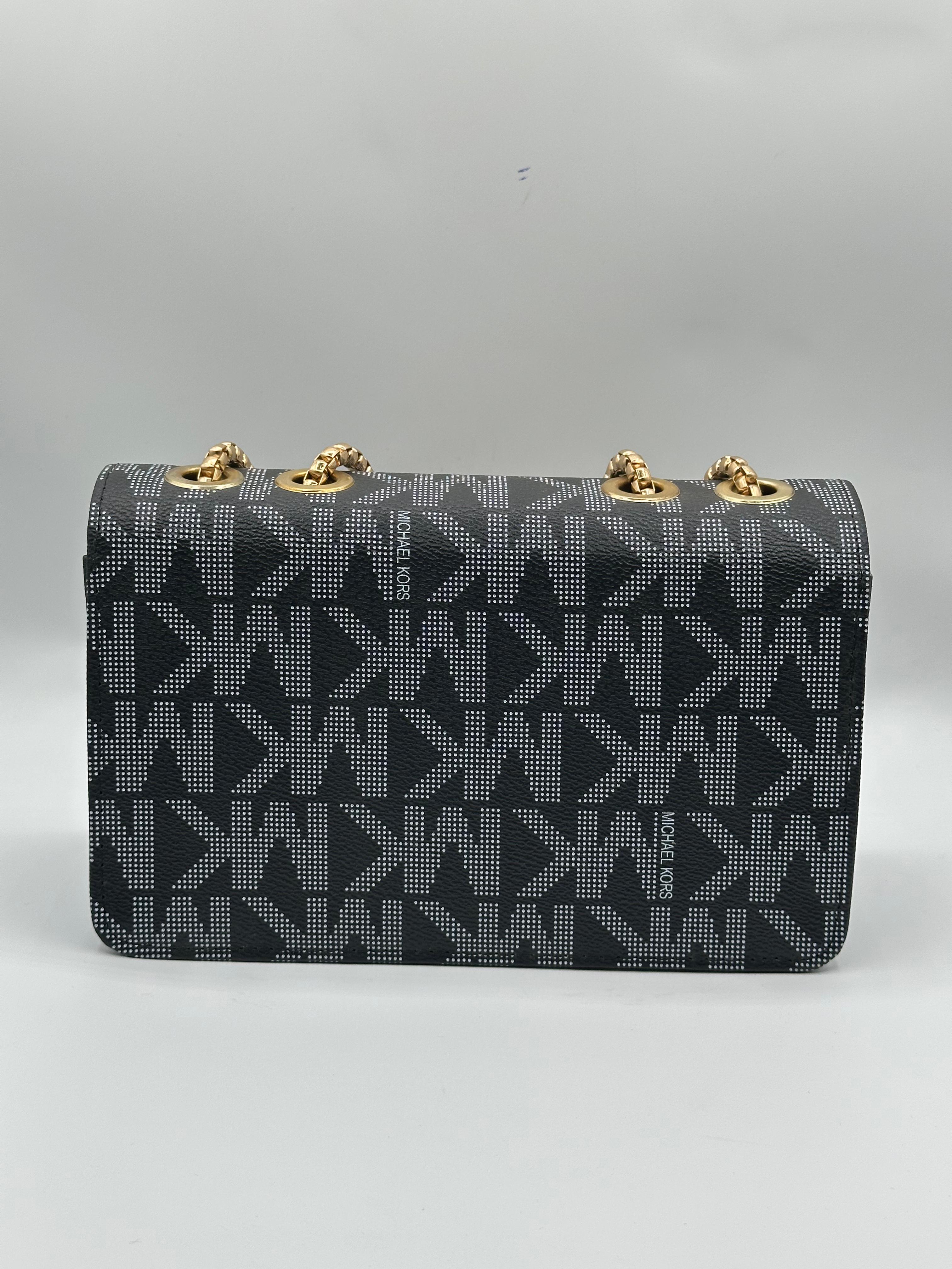 WhatsAppImage2024-12-27at16.50.41 Michael Kors Premium Quality All-Over Printed Ladies Side Bag with Buckle - Image 2